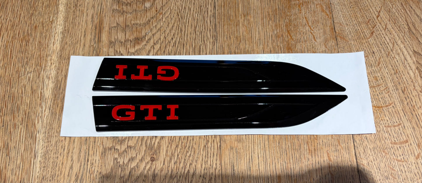 VW Golf MK8 / MK8.5 GTI Side Wing Badges – Gloss Black & Red (Pair)
